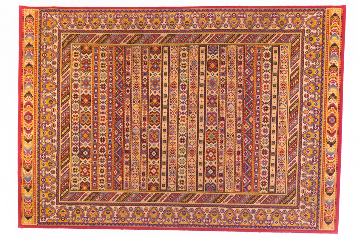 grand tapis oriental vintage, couleurs chaudes, agence Parade